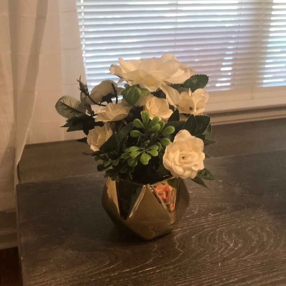 Small flower bouquet. Gold white and greenery